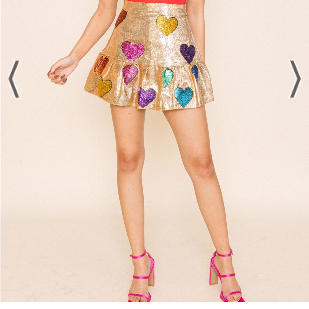 Queen of sparkles gold heart skirt. Size M NWT never worn no flaws